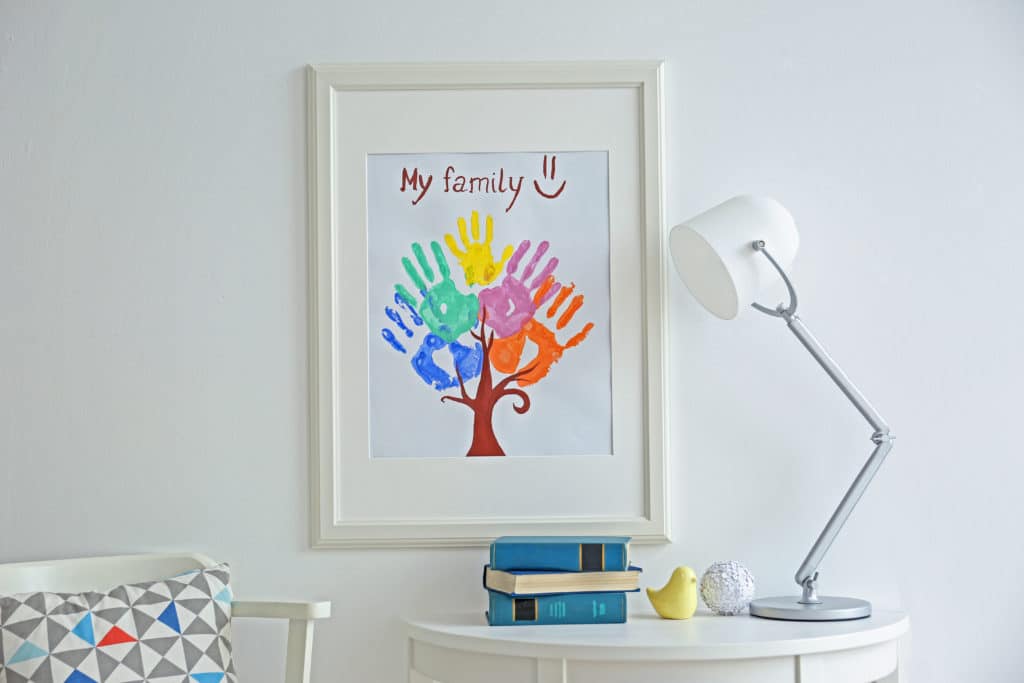 Framing children's art - Family hand prints in frame